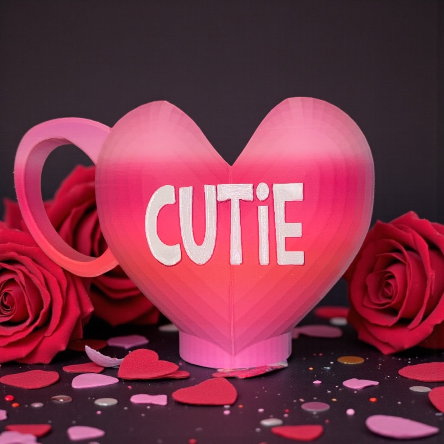 3d printed “CUTIE” holiday heart shaped skinny drink holder.